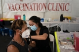Long COVID symptoms common; US surpasses 700k deaths. Latest updates