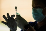 FDA backs Pfizer COVID-19 boosters for seniors, high-risk