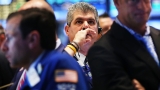 Futures fall to start week with key inflation data, earnings ahead