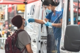 U.S. Covid cases show signs of slowing, even as fatalities surge again