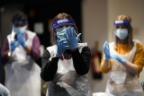 Covid vaccinations have slumped in parts of the U.S. and Europe