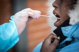 Covid infections plummet 90% from U.S. pandemic high, states lift mask mandates