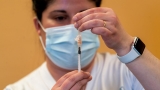 CDC says waiting longer between Pfizer, Moderna doses may reduce myocarditis risk