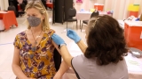 CDC panel skeptical of fourth Covid shots for all, says U.S. needs clear vaccine strategy