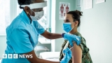Covid: UK first country to approve dual-strain vaccine – BBC