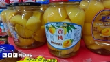 China Covid: 'Panic-buying' and shortages as restrictions are eased – BBC