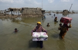OECD: Russia war, virus and climate hurting world’s poorest