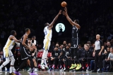 Nets score 91 in 1st half, wallop weary Warriors 143-113