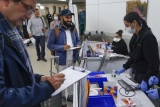 As COVID surges in China, US begins testing more travelers