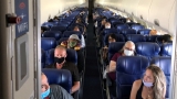 Vacant middle seat on flights could cut exposure to virus, CDC study shows