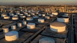 Oil prices climb on easing China COVID-19 curbs, concerns over US storm impact
