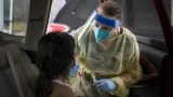 States that had some of the worst Covid-19 case rates in past week also reported the highest rates of new vaccinations