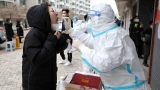 A Covid-19 spike like the one in China is unlikely in the US, experts say. Here’s why