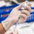 The AP Interview: US ‘vulnerable’ to COVID without new shots