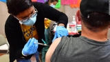 Biden administration will stop buying Covid-19 vaccines, treatments and tests as early as this fall, Jha says