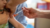 Covid-19 vaccines will be on the 2023 vaccine schedule, but that doesn’t mean they’re required in schools