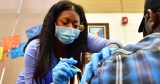 Omicron Covid booster better protection against symptoms, CDC says
