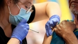 50,000-300,000 omicron deaths projected; free tests available: Updates