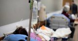 U.S. coronavirus hospitalizations hit eight-month high over 100,000