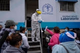 The Latest: Hong Kong to allow in foreign domestic workers