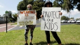 Coronavirus: Florida judge says schools can go ahead with mask mandates – as it happened