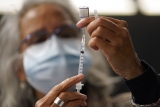 Fourth COVID vaccine shot recommended for moderately or severely immunocompromised individuals, CDC says