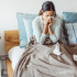 Flu activity remains high but shows signs of slowing in parts of the US, CDC says