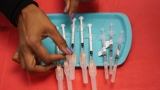 The Latest: CDC head acknowledges confusion over boosters – Greensboro News & Record