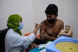 Schools close, fairs on amid omicron surge in Bangladesh