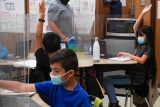 Texas big-city schools are dropping their mask mandates in response to new CDC guidelines