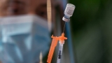 Vaccine opposition down, pace of shots accelerating: COVID updates