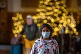 Health officials are urging masks again amid high COVID, flu levels