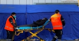 China’s stretched health system braces for peak in COVID infections