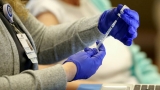 Coronavirus: Veterans Affairs becomes first US agency to mandate staff vaccine – as it happened