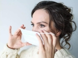 Are COVID symptoms milder with a re-infection?