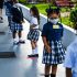 The Latest: Japan reports daily record for new virus cases