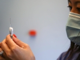 The side effects to expect after getting an Omicron booster — and what happens if you get a flu shot at the same time