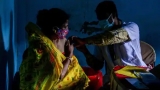 ‘Unprecedented milestone!’ says health minister as 50% of India’s adults get first anti-Covid dose