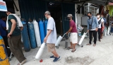 World Health Organization says governments should use ‘extreme caution’ in fully lifting COVID-19 restrictions