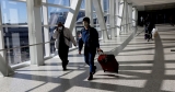 U.S. CDC says travelers should still wear masks on airplanes