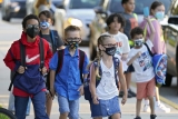 Unmasked elementary school teacher infects half of class with COVID-19, CDC says