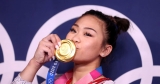 U.S. gymnastics reign continues as Biles lauds gold medallist Lee
