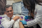Becerra boosted: US Secretary of Health gets COVID-19 shot in Harlem, responds to Biden’s claim that pandemic is over
