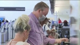 Florida reports 60,204 new COVID cases as US health officials say some areas should consider masks again
