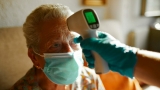 Seniors report fewer reactions after second COVID booster dose, CDC finds –