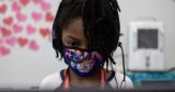 U.S. CDC updates school guidance to emphasize in-person learning