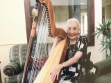 87-year-old harpist plays for patients in hospice