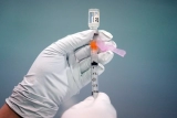 You had the Johnson & Johnson coronavirus vaccine. Should you try to get a booster dose of Pfizer or Moderna?