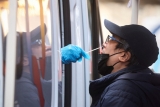 News Wrap: WHO says global COVID-19 cases drop by nearly a quarter