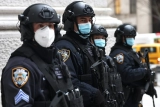Coronavirus live updates: Fauci urges police officers to get vaccinated as unions protest